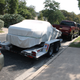 Illustration for article titled Towing A Race Car With A Small House: The Silverado 2500 High Country